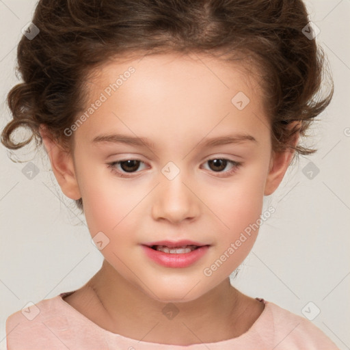 Joyful white child female with short  brown hair and brown eyes