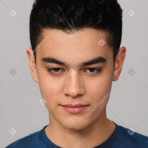 Joyful white young-adult male with short  black hair and brown eyes