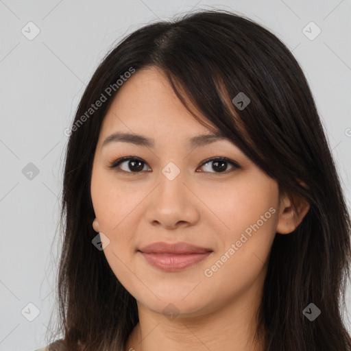 Joyful asian young-adult female with long  brown hair and brown eyes