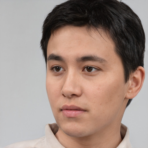 Neutral white young-adult male with short  black hair and brown eyes