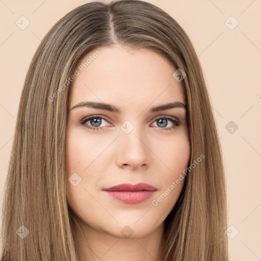 Neutral white young-adult female with long  brown hair and brown eyes