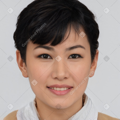 Joyful asian young-adult female with short  brown hair and brown eyes