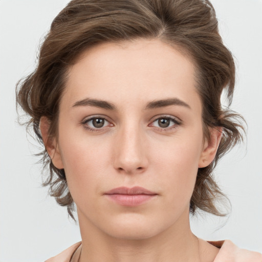 Neutral white young-adult female with medium  brown hair and grey eyes