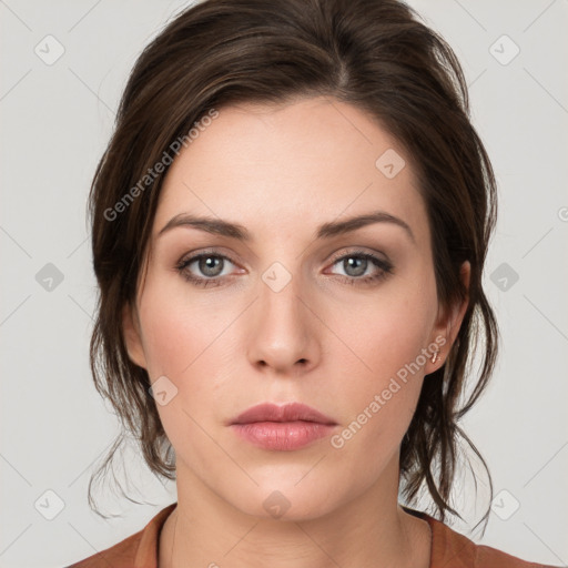 Neutral white young-adult female with medium  brown hair and grey eyes