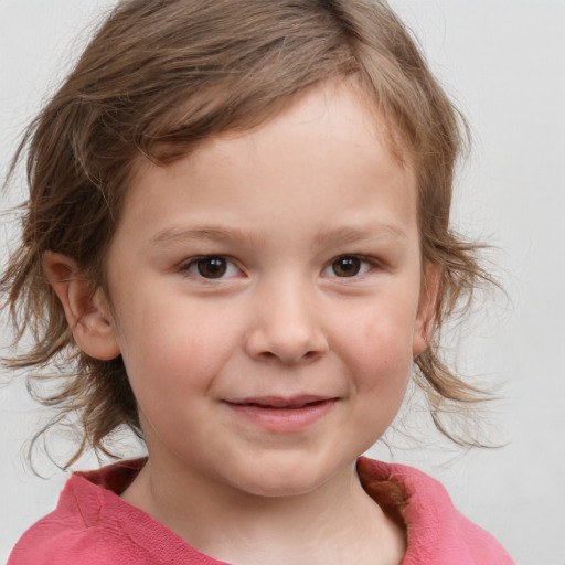 Joyful white child female with medium  brown hair and grey eyes