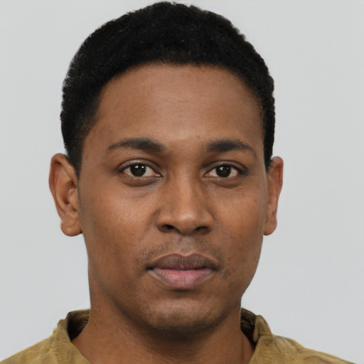 Neutral black young-adult male with short  black hair and brown eyes