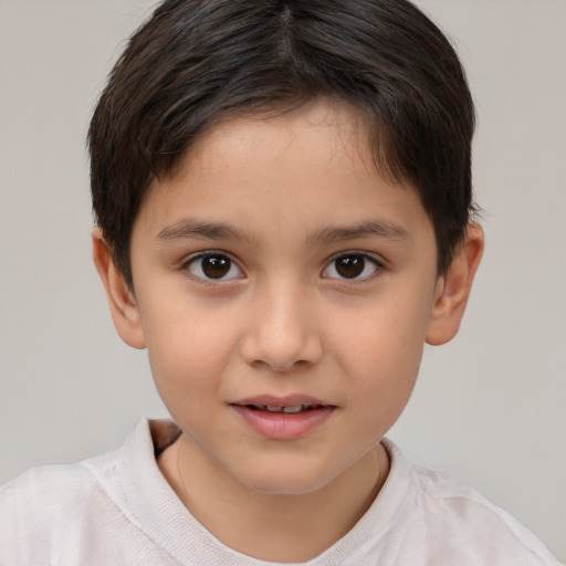 Joyful white child female with short  brown hair and brown eyes