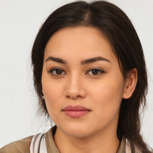 Neutral latino young-adult female with long  brown hair and brown eyes