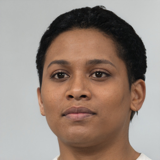 Neutral latino young-adult female with short  black hair and brown eyes