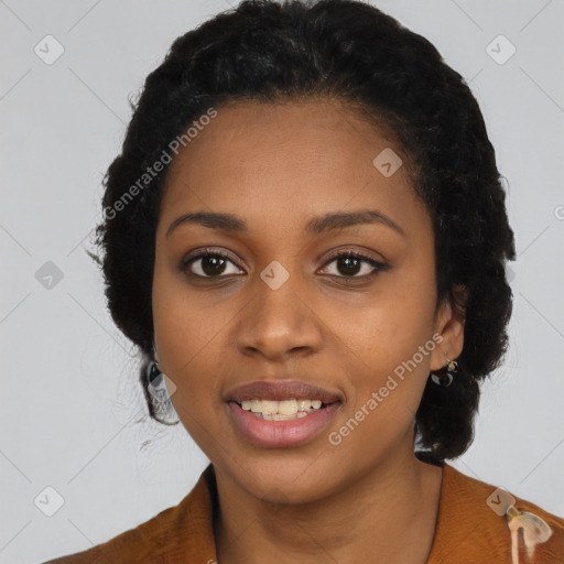 Joyful black young-adult female with long  black hair and brown eyes