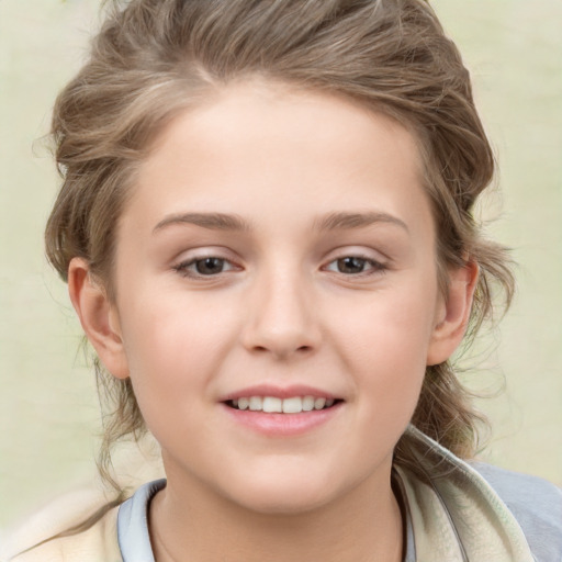 Joyful white child female with medium  brown hair and brown eyes