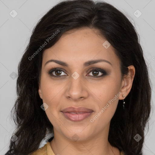 Joyful latino young-adult female with long  brown hair and brown eyes