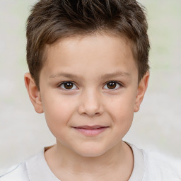 Joyful white child male with short  brown hair and brown eyes