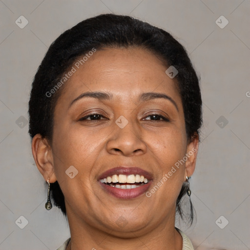 Joyful black adult female with short  brown hair and brown eyes