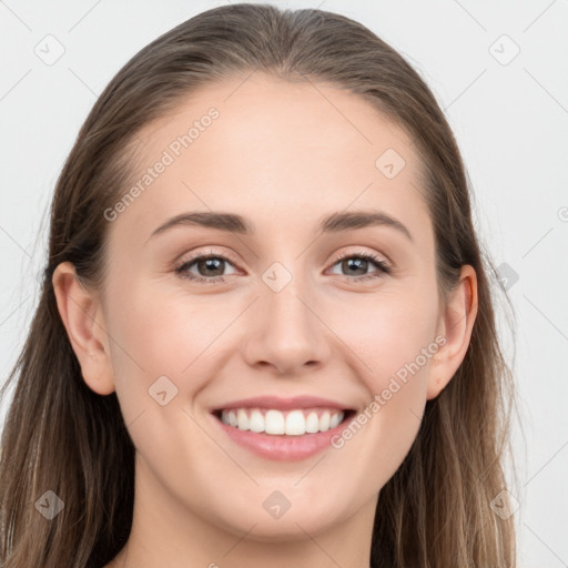 Joyful white young-adult female with long  brown hair and grey eyes