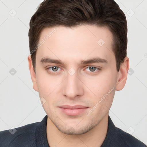 Neutral white young-adult male with short  brown hair and grey eyes