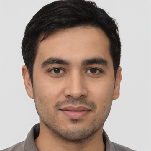 Neutral latino young-adult male with short  black hair and brown eyes