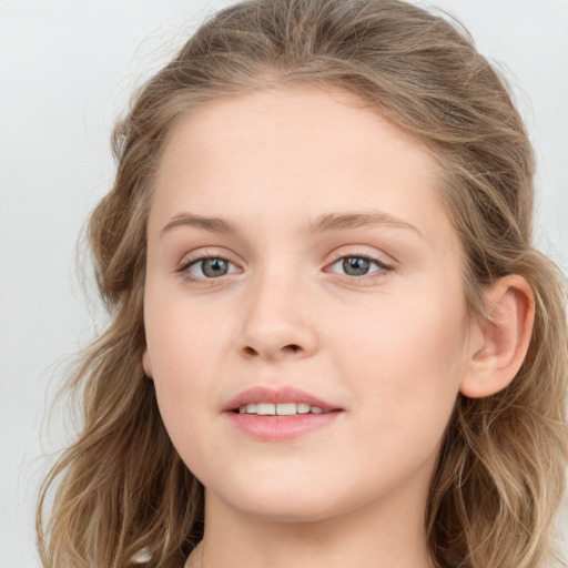 Joyful white young-adult female with long  brown hair and blue eyes