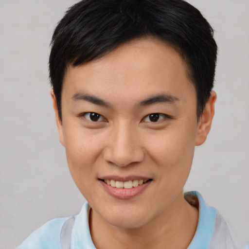 Joyful white young-adult female with short  black hair and brown eyes