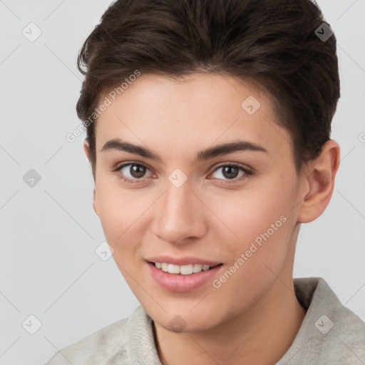 Joyful white young-adult female with short  brown hair and brown eyes