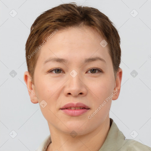 Joyful white young-adult female with short  brown hair and brown eyes