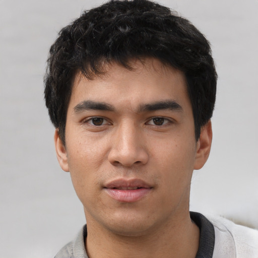 Neutral asian young-adult male with short  black hair and brown eyes