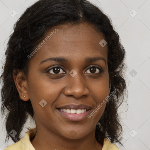 Joyful black young-adult female with medium  brown hair and brown eyes