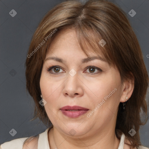 Joyful white adult female with medium  brown hair and brown eyes