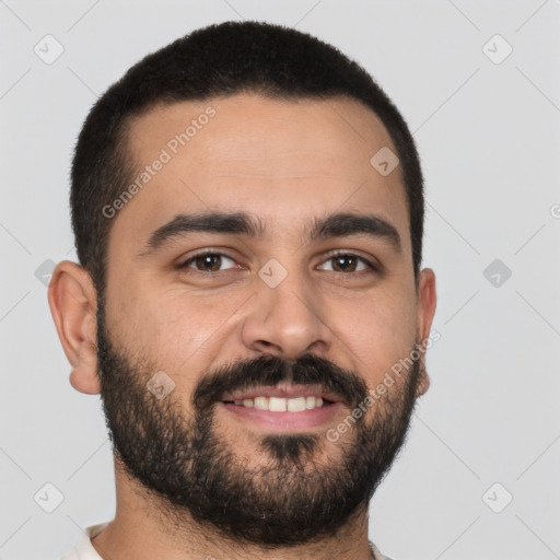 Joyful latino young-adult male with short  black hair and brown eyes