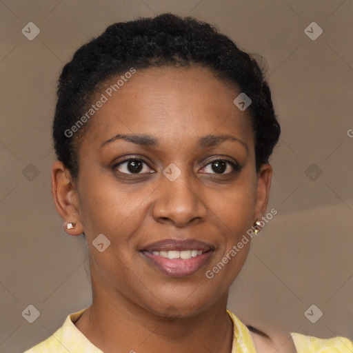 Joyful black adult female with short  brown hair and brown eyes
