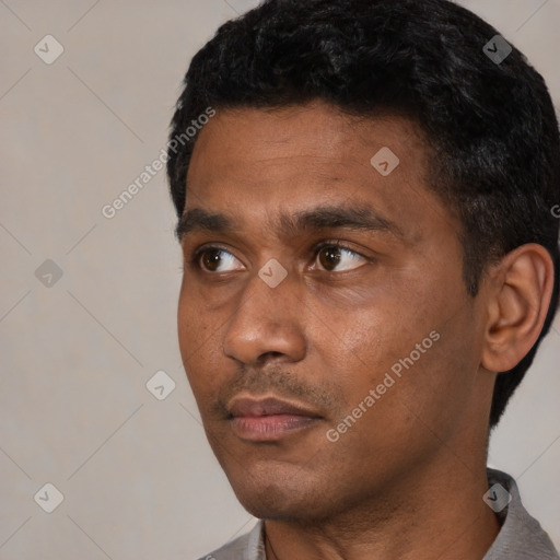Neutral black young-adult male with short  black hair and brown eyes