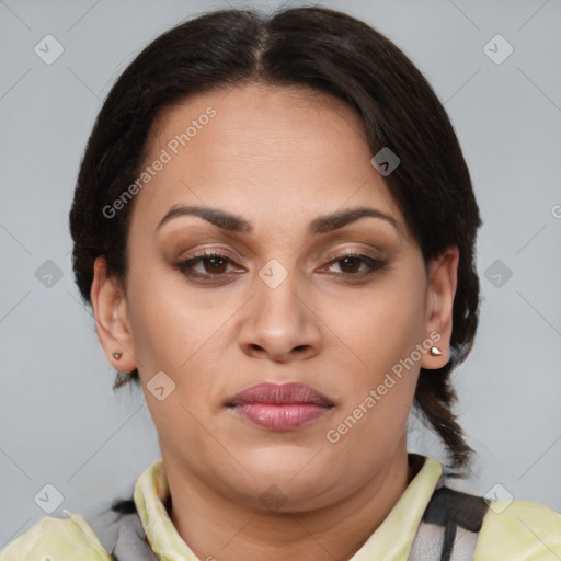 Joyful asian adult female with medium  brown hair and brown eyes