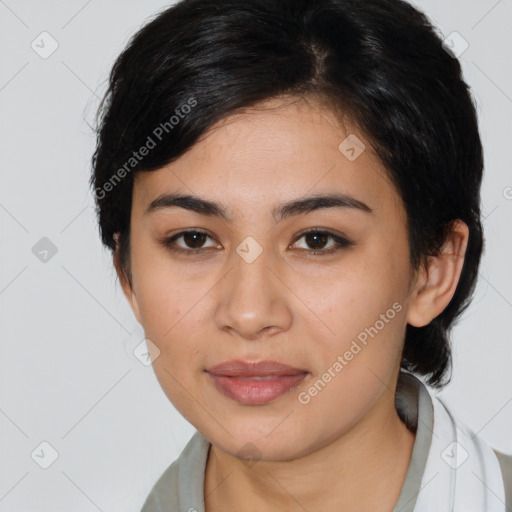 Joyful latino young-adult female with medium  brown hair and brown eyes