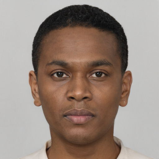 Neutral black young-adult male with short  black hair and brown eyes