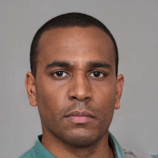 Neutral latino young-adult male with short  brown hair and brown eyes