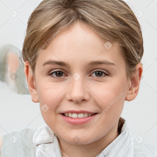 Joyful white child female with short  brown hair and grey eyes