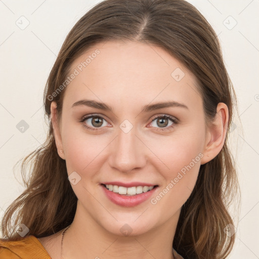 Joyful white young-adult female with medium  brown hair and blue eyes