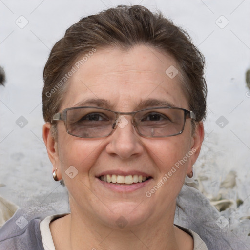 Joyful white adult female with short  brown hair and brown eyes