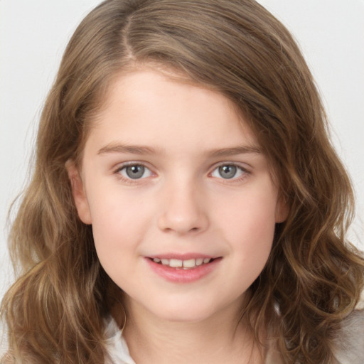 Joyful white child female with medium  brown hair and brown eyes