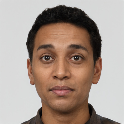 Neutral latino adult male with short  black hair and brown eyes