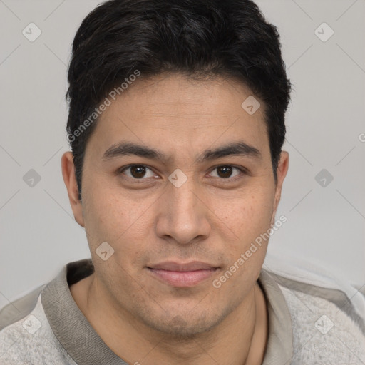 Joyful latino young-adult male with short  brown hair and brown eyes