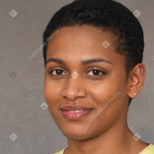 Joyful black young-adult female with short  brown hair and brown eyes