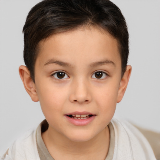 Joyful white child female with short  brown hair and brown eyes