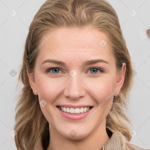 Joyful white young-adult female with medium  brown hair and blue eyes