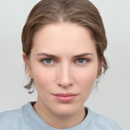 Neutral white young-adult female with medium  brown hair and grey eyes