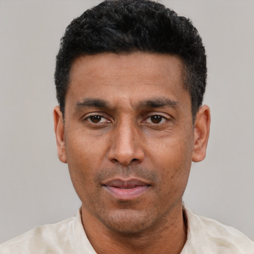 Neutral latino adult male with short  black hair and brown eyes