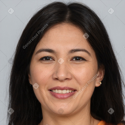 Joyful white adult female with long  brown hair and brown eyes