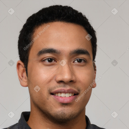 Joyful latino young-adult male with short  black hair and brown eyes