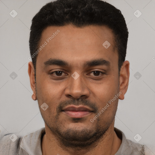 Neutral latino young-adult male with short  black hair and brown eyes