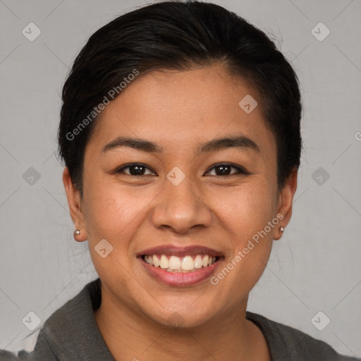 Joyful asian young-adult female with short  brown hair and brown eyes